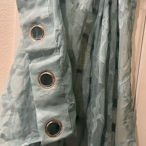 Elegant Sheer Blue Curtains with Silver Rings